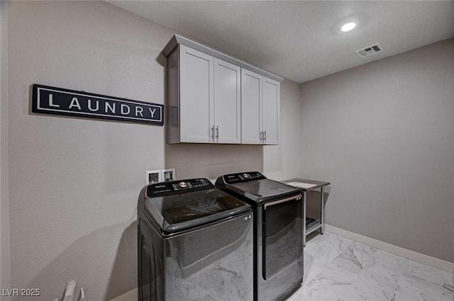 7572 Mount Spokane Ct, Las Vegas, NV 89113 - laundry room with cabinet space, washing machine and clothes dryer, light marble finish floors, baseboards, and recessed lighting