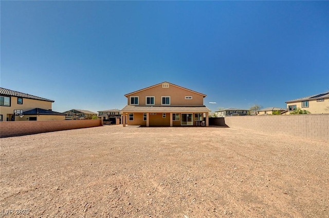 7572 Mount Spokane Ct, Las Vegas, NV 89113 - rear view of property with a fenced backyard