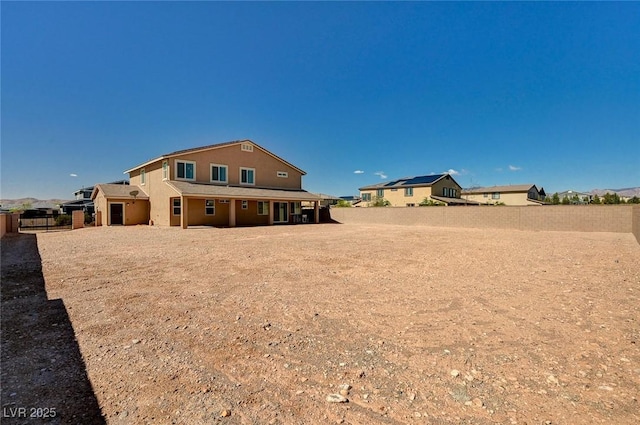 7572 Mount Spokane Ct, Las Vegas, NV 89113 - rear view of property with a fenced backyard