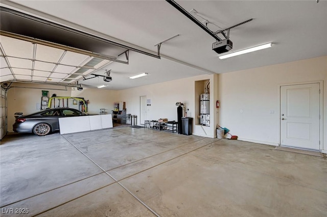 7572 Mount Spokane Ct, Las Vegas, NV 89113 - garage featuring a garage door opener and strapped water heater