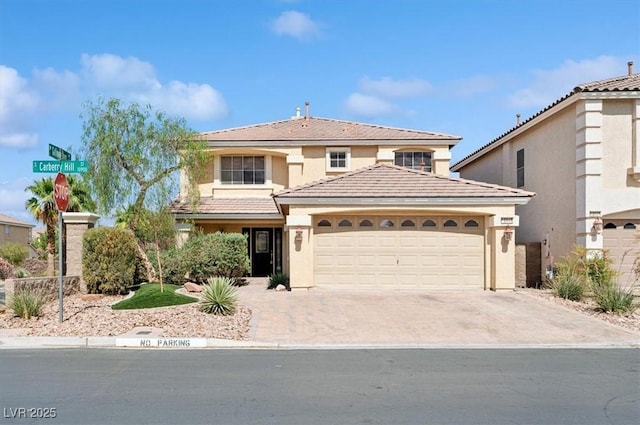 10948 Carberry Hill St, Las Vegas, NV 89141 - view of front facade with driveway, an attached garage, and stucco siding