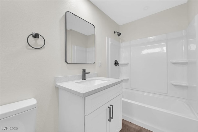 952 Balzar Ave, Las Vegas, NV 89106 - full bath with vanity, toilet, bathtub / shower combination, and wood finished floors