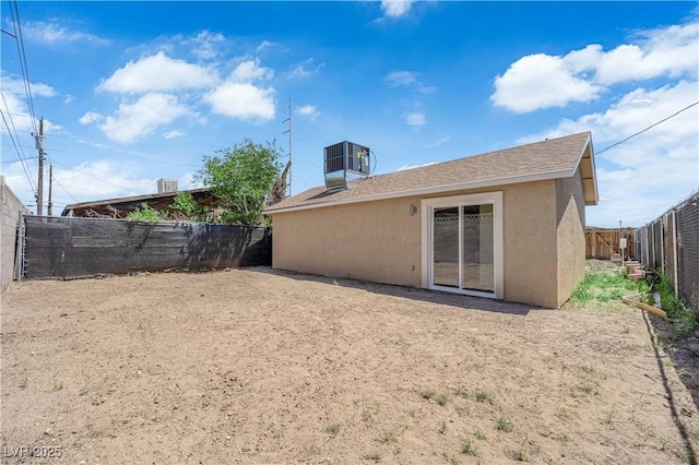 952 Balzar Ave, Las Vegas, NV 89106 - back of property featuring stucco siding, a fenced backyard, and cooling unit