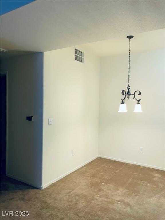 2121 Hussium Hills St Unit 107, Las Vegas, NV 89108 - unfurnished room featuring carpet floors and baseboards