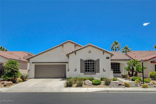 10608 Trussell St, Las Vegas, NV 89141 - mediterranean / spanish-style house with an attached garage, driveway, stucco siding, and a tiled roof