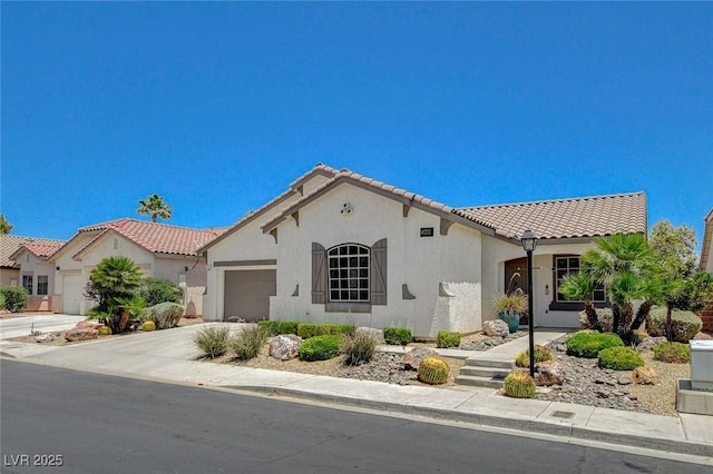 10608 Trussell St, Las Vegas, NV 89141 - mediterranean / spanish-style home with a garage, stucco siding, a tile roof, and concrete driveway