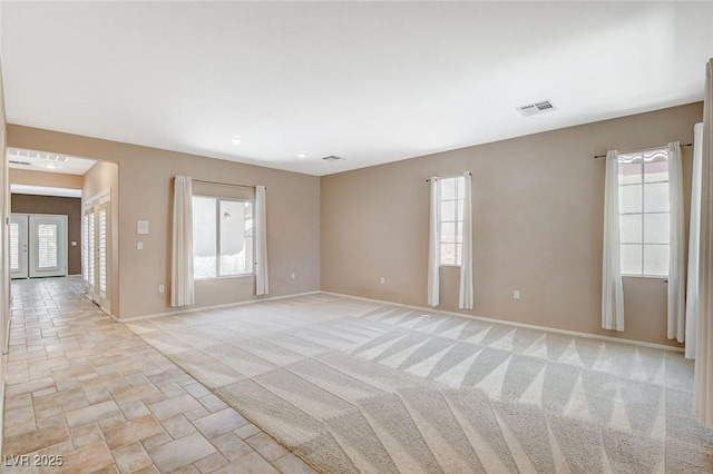 10608 Trussell St, Las Vegas, NV 89141 - unfurnished room with light carpet and light stone finish flooring
