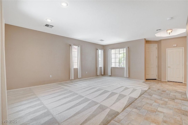 10608 Trussell St, Las Vegas, NV 89141 - unfurnished room with light stone finish flooring, recessed lighting, and a smoke detector
