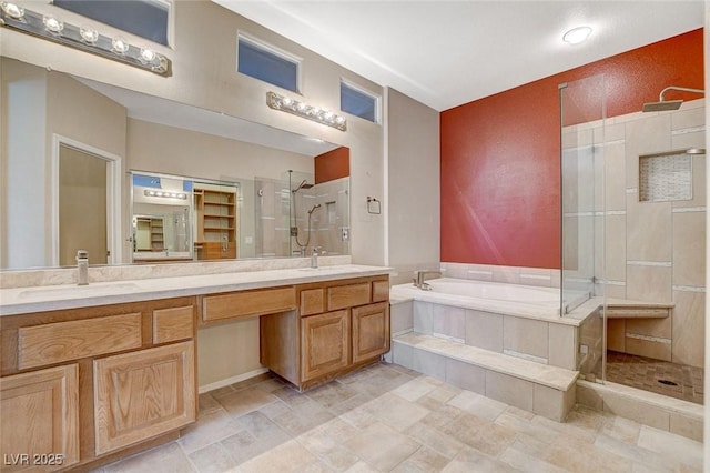 10608 Trussell St, Las Vegas, NV 89141 - bathroom featuring a stall shower, double vanity, a garden tub, and stone finish flooring