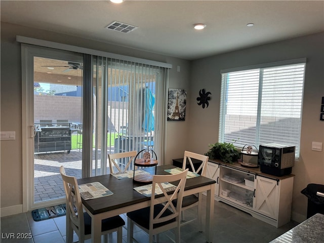 7855 Skyler Falls Ln, North Las Vegas, NV 89084 - dining space with healthy amount of natural light, tile patterned floors, and a ceiling fan