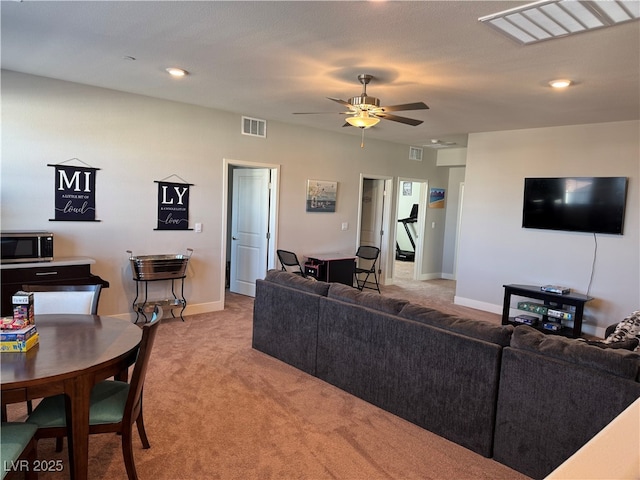 7855 Skyler Falls Ln, North Las Vegas, NV 89084 - living room featuring light carpet, a ceiling fan, baseboards, and recessed lighting