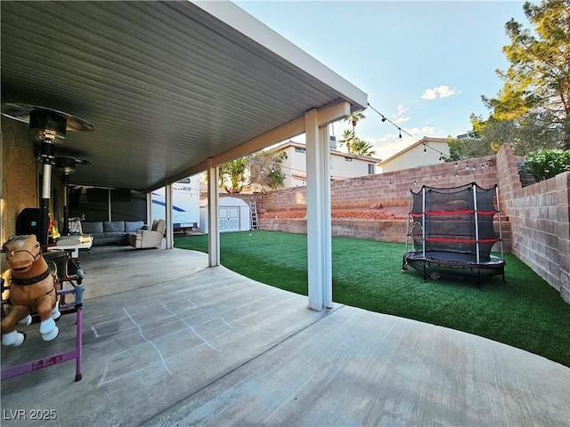 1482 Flintrock Rd, Henderson, NV 89014 - view of patio / terrace with a trampoline and an outdoor hangout area