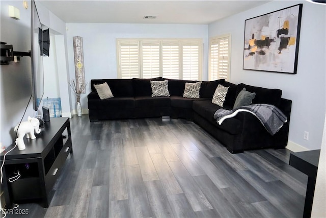 1482 Flintrock Rd, Henderson, NV 89014 - living room featuring wood finished floors and baseboards