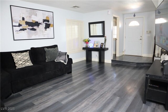 1482 Flintrock Rd, Henderson, NV 89014 - living room featuring wood finished floors and baseboards