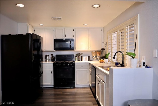 1482 Flintrock Rd, Henderson, NV 89014 - kitchen featuring black appliances, a sink, dark wood-style flooring, light countertops, and recessed lighting