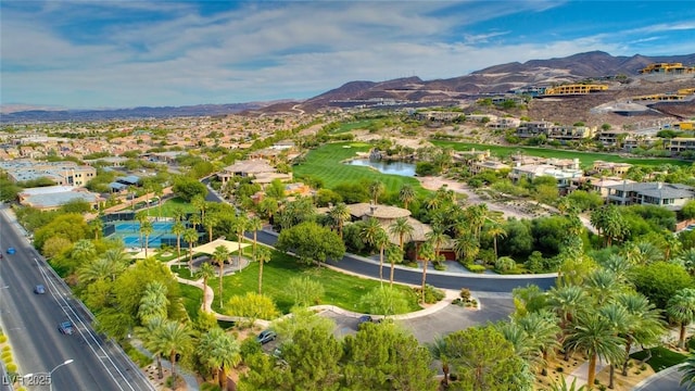 677 Overlook Rim Dr, Henderson, NV 89012 - aerial overview of property's location with a mountain backdrop and nearby suburban area