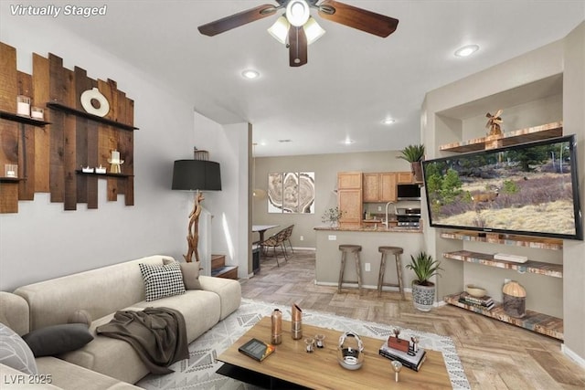 6581 Netherseal Ave, Las Vegas, NV 89139 - living area featuring ceiling fan, baseboards, and recessed lighting