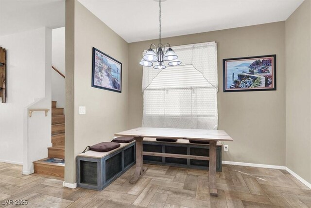 6581 Netherseal Ave, Las Vegas, NV 89139 - dining space featuring baseboards, stairs, and a chandelier