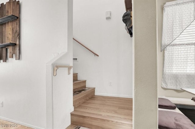 6581 Netherseal Ave, Las Vegas, NV 89139 - staircase with wood finished floors and baseboards