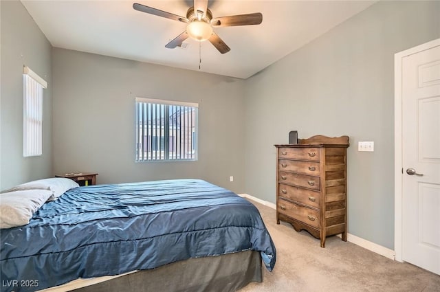 9303 Gilcrease Ave Unit 1002, Las Vegas, NV 89149 - bedroom featuring light colored carpet, ceiling fan, and baseboards
