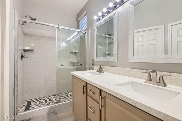 9303 Gilcrease Ave Unit 1002, Las Vegas, NV 89149 - bathroom with a shower stall and double vanity