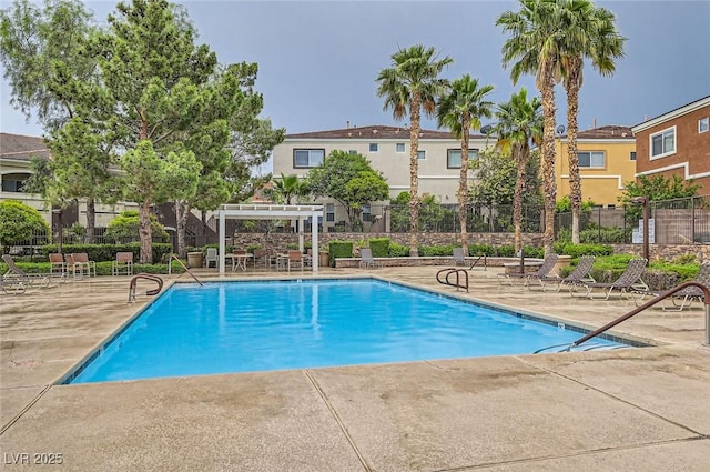 9303 Gilcrease Ave Unit 1002, Las Vegas, NV 89149 - community pool featuring a pergola and a patio