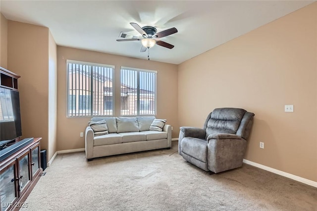 9303 Gilcrease Ave Unit 1002, Las Vegas, NV 89149 - living room with ceiling fan, carpet floors, and baseboards