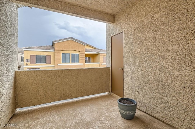 9303 Gilcrease Ave Unit 1002, Las Vegas, NV 89149 - view of home's exterior with a balcony and stucco siding