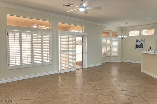2501 Maddington Dr, Las Vegas, NV 89134 - spare room featuring a chandelier, crown molding, ceiling fan, light tile patterned flooring, and baseboards
