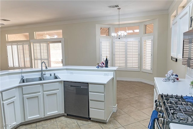 2501 Maddington Dr, Las Vegas, NV 89134 - kitchen with stainless steel appliances, a sink, crown molding, a chandelier, and light tile patterned floors