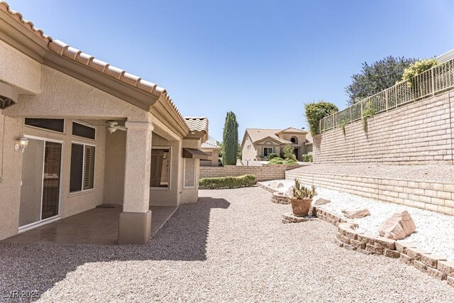 2501 Maddington Dr, Las Vegas, NV 89134 - fenced backyard with a patio area
