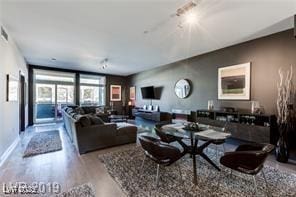 8925 W Flamingo Rd Unit 117, Las Vegas, NV 89147 - living room with wood finished floors
