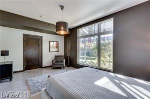 8925 W Flamingo Rd Unit 117, Las Vegas, NV 89147 - bedroom featuring baseboards