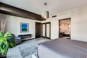 8925 W Flamingo Rd Unit 117, Las Vegas, NV 89147 - bedroom featuring french doors