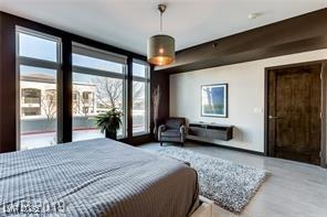 8925 W Flamingo Rd Unit 117, Las Vegas, NV 89147 - bedroom featuring wood finished floors