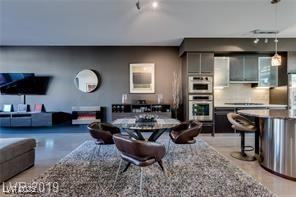 8925 W Flamingo Rd Unit 117, Las Vegas, NV 89147 - living room with track lighting