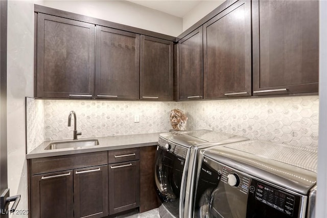787 Keyland St, Las Vegas, NV 89138 - laundry area with cabinet space and washing machine and dryer