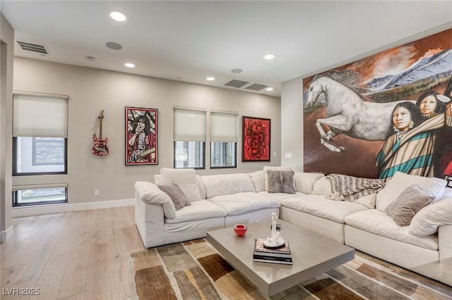 787 Keyland St, Las Vegas, NV 89138 - living room with light wood-type flooring, recessed lighting, baseboards, and plenty of natural light