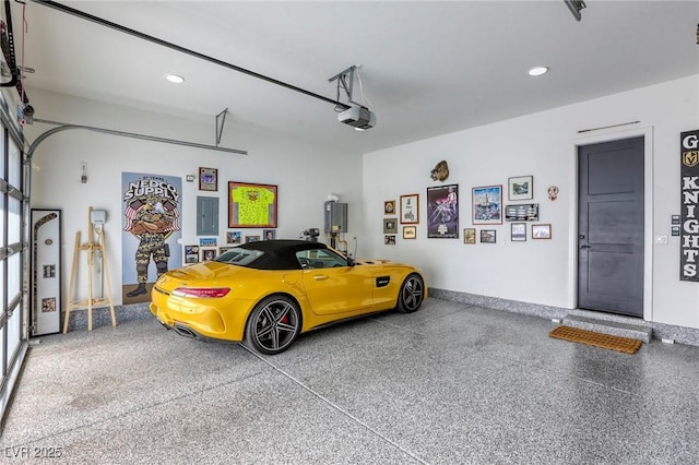 787 Keyland St, Las Vegas, NV 89138 - garage with electric panel, a garage door opener, and recessed lighting