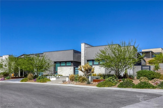 787 Keyland St, Las Vegas, NV 89138 - view of front of house featuring stucco siding