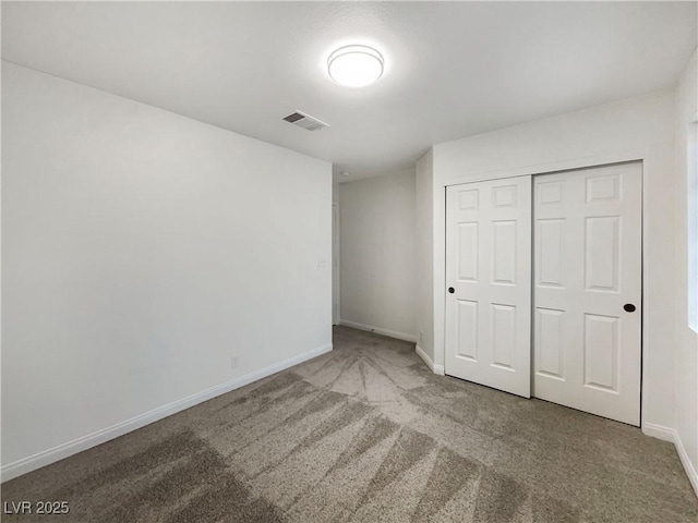 6120 Desert Haven Rd, Las Vegas, NV 89130 - unfurnished bedroom with carpet flooring, baseboards, and a closet