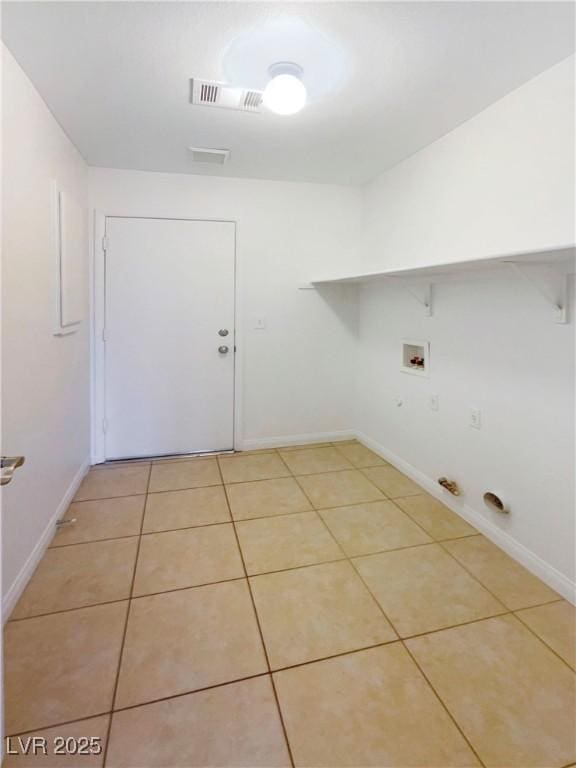 6120 Desert Haven Rd, Las Vegas, NV 89130 - laundry room featuring washer hookup, light tile patterned floors, baseboards, and gas dryer hookup