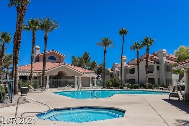 7912 Foxwood Pl Unit 104, Las Vegas, NV 89145 - community pool with a hot tub, a patio, and cooling unit