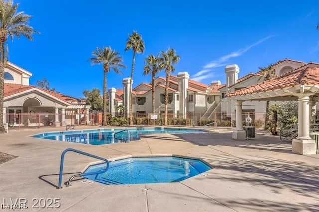 7912 Foxwood Pl Unit 104, Las Vegas, NV 89145 - community pool featuring a patio area, a residential view, and a community hot tub