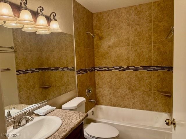 7912 Foxwood Pl Unit 104, Las Vegas, NV 89145 - bathroom with bathtub / shower combination, toilet, and vanity
