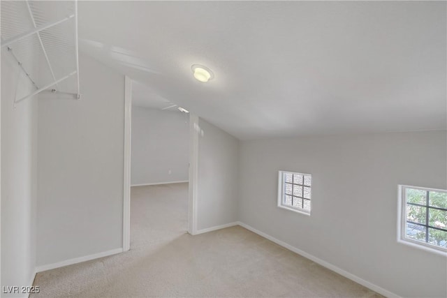 8913 Loggers Mill Ave, Las Vegas, NV 89143 - additional living space featuring vaulted ceiling, carpet floors, and baseboards