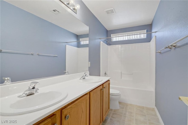8913 Loggers Mill Ave, Las Vegas, NV 89143 - bathroom with bathtub / shower combination, double vanity, and toilet