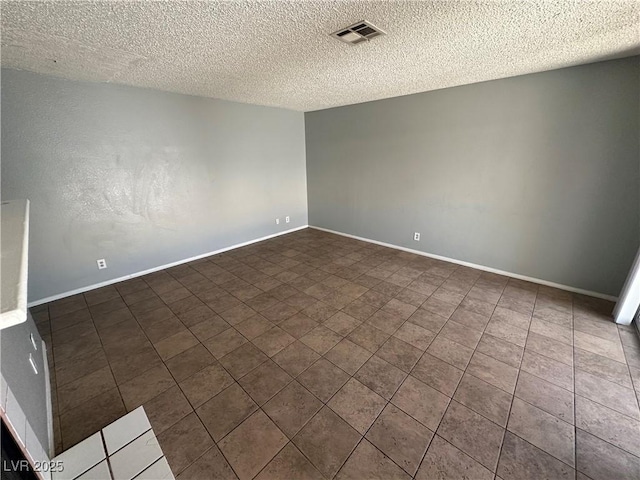 227 N Lamb Blvd Unit A, Las Vegas, NV 89110 - empty room with a textured ceiling and baseboards