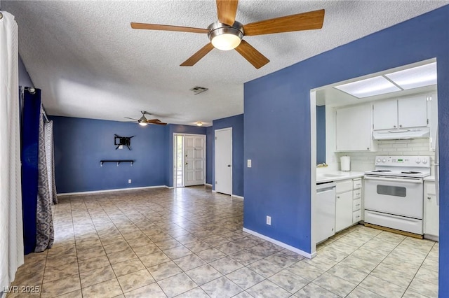 2349 Wooster Cir Unit A, Las Vegas, NV 89108 - kitchen with white appliances, a ceiling fan, a textured ceiling, light countertops, and white cabinetry
