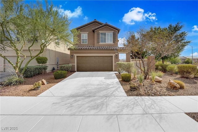 1104 Aspen Cliff Dr, Henderson, NV 89011 - view of front of property with concrete driveway, an attached garage, stucco siding, and a tiled roof